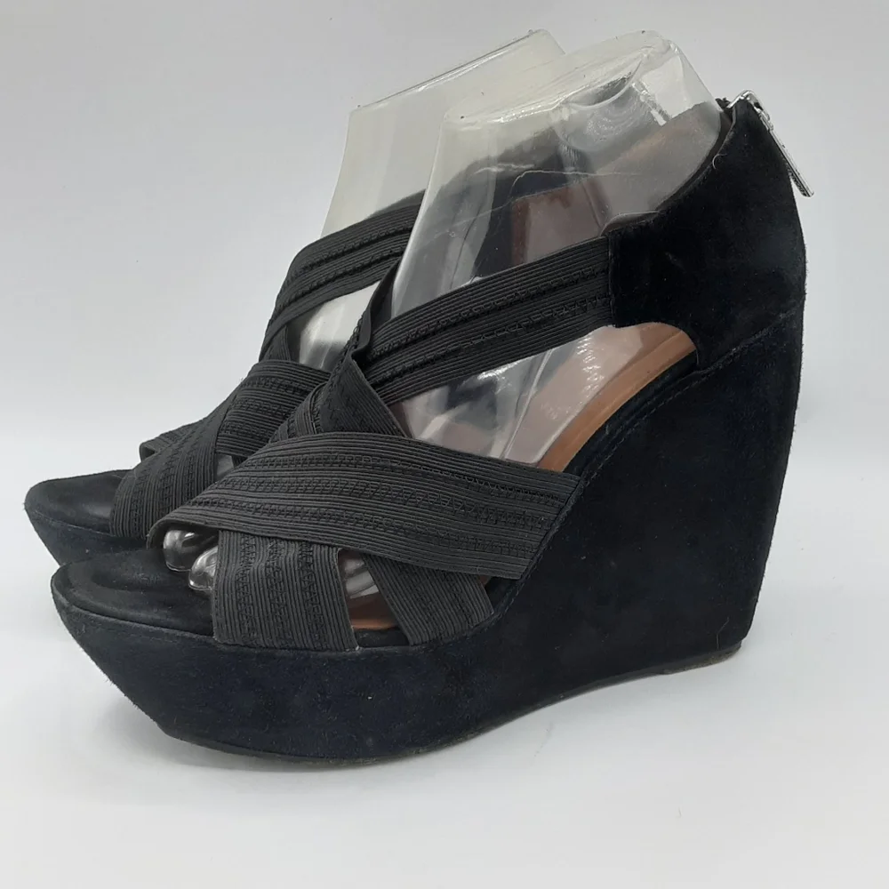 Donald J Pliner suede peep toe wedge heel.